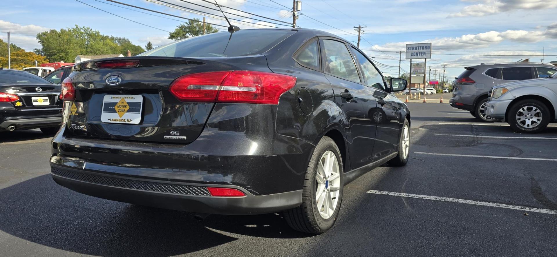 2015 Black /Black Ford Focus SE Sedan (1FADP3F25FL) with an 2.0L L4 DOHC 16V engine, AUTOMATIC transmission, located at 1010 N White Horse Pike, Stratford, NJ, 08084, (856) 262-9500, 39.838921, -75.011497 - Photo#3