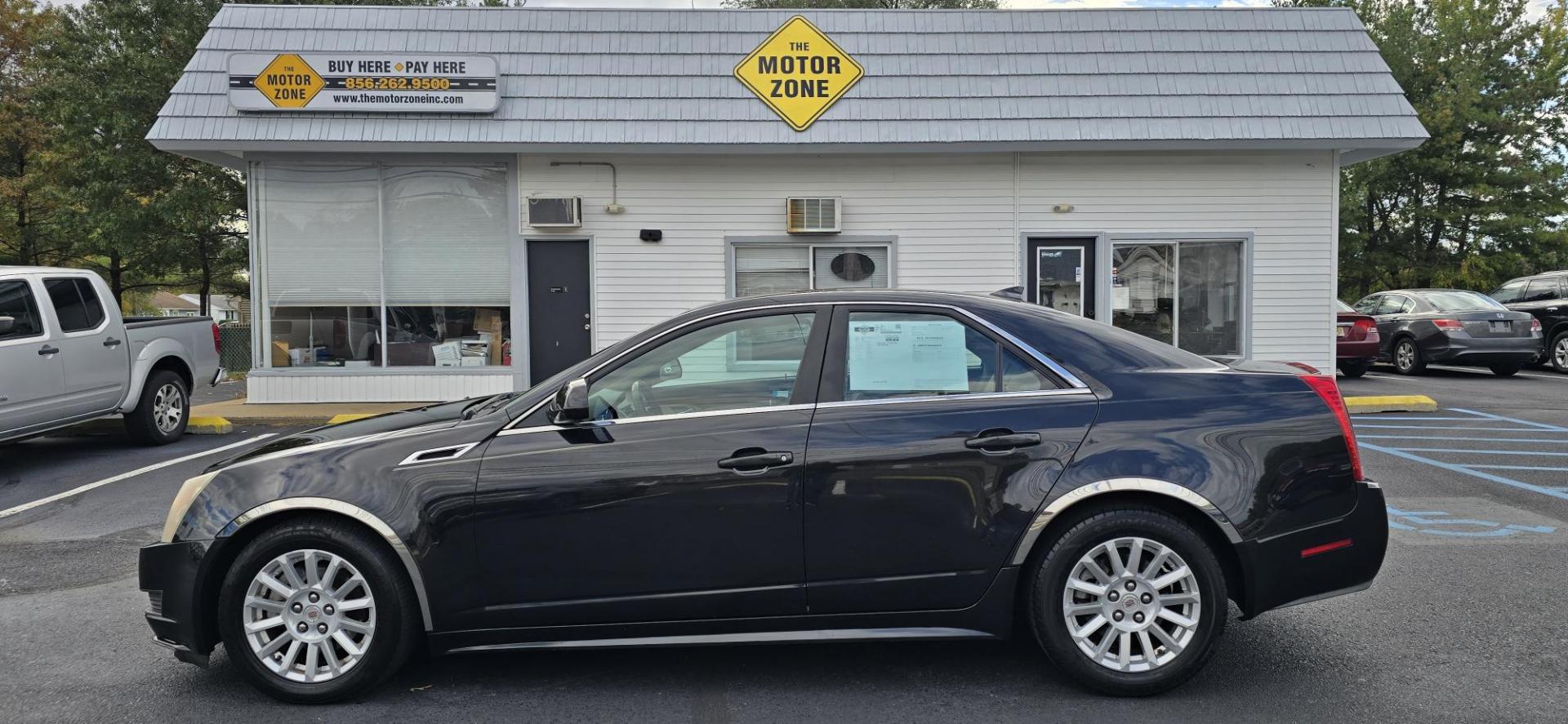 2012 Black /Tan Cadillac CTS Luxury AWD (1G6DG5E54C0) with an 3.0L V6 DOHC 24V FFV engine, 6-Speed Automatic transmission, located at 1010 N White Horse Pike, Stratford, NJ, 08084, (856) 262-9500, 39.838921, -75.011497 - Photo#4