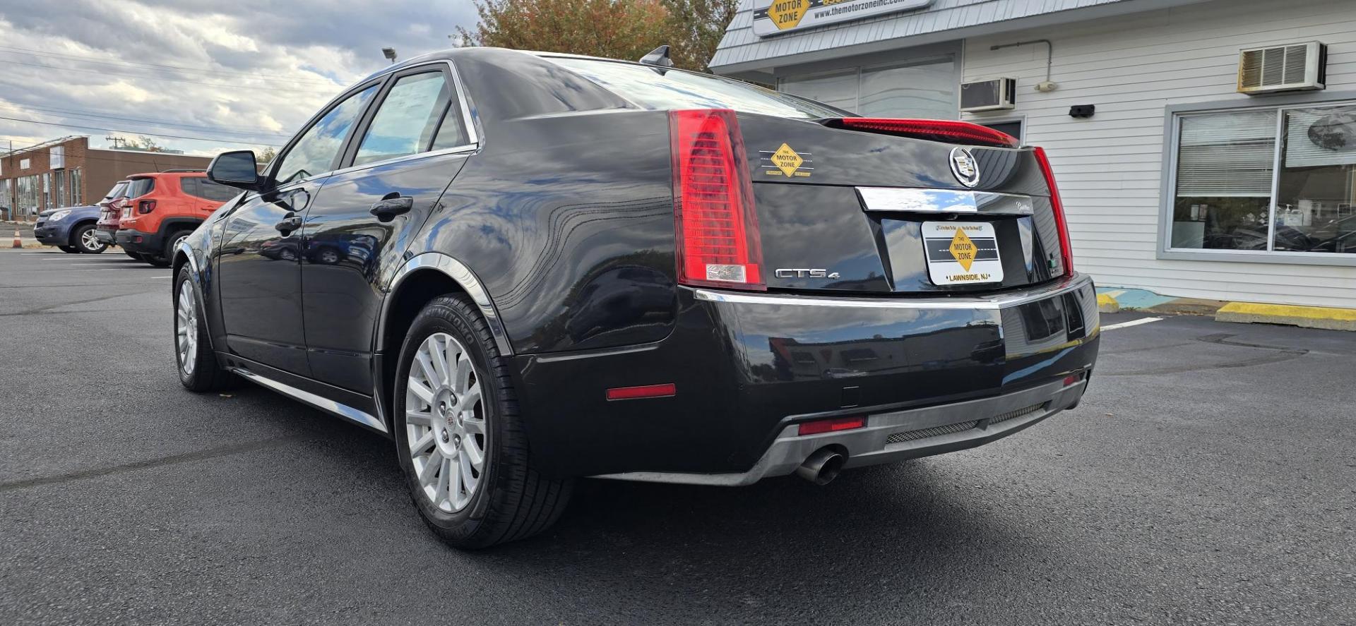 2012 Black /Tan Cadillac CTS Luxury AWD (1G6DG5E54C0) with an 3.0L V6 DOHC 24V FFV engine, 6-Speed Automatic transmission, located at 1010 N White Horse Pike, Stratford, NJ, 08084, (856) 262-9500, 39.838921, -75.011497 - Photo#2