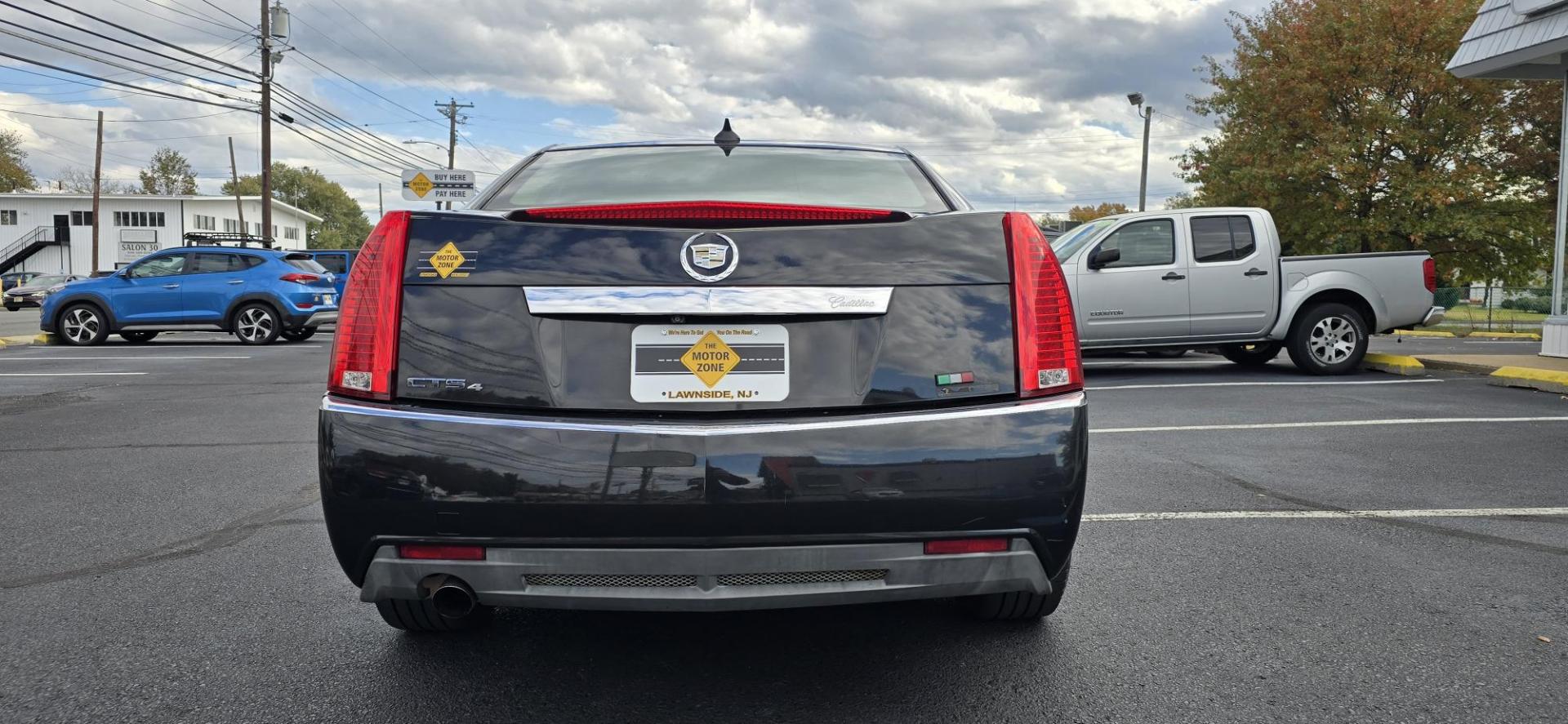 2012 Black /Tan Cadillac CTS Luxury AWD (1G6DG5E54C0) with an 3.0L V6 DOHC 24V FFV engine, 6-Speed Automatic transmission, located at 1010 N White Horse Pike, Stratford, NJ, 08084, (856) 262-9500, 39.838921, -75.011497 - Photo#7