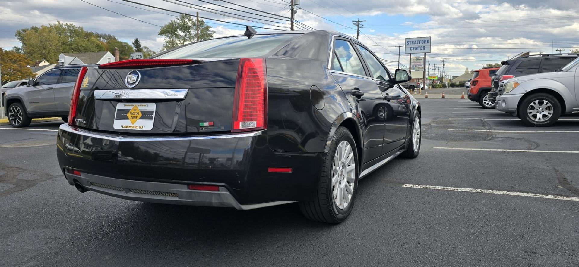 2012 Black /Tan Cadillac CTS Luxury AWD (1G6DG5E54C0) with an 3.0L V6 DOHC 24V FFV engine, 6-Speed Automatic transmission, located at 1010 N White Horse Pike, Stratford, NJ, 08084, (856) 262-9500, 39.838921, -75.011497 - Photo#3