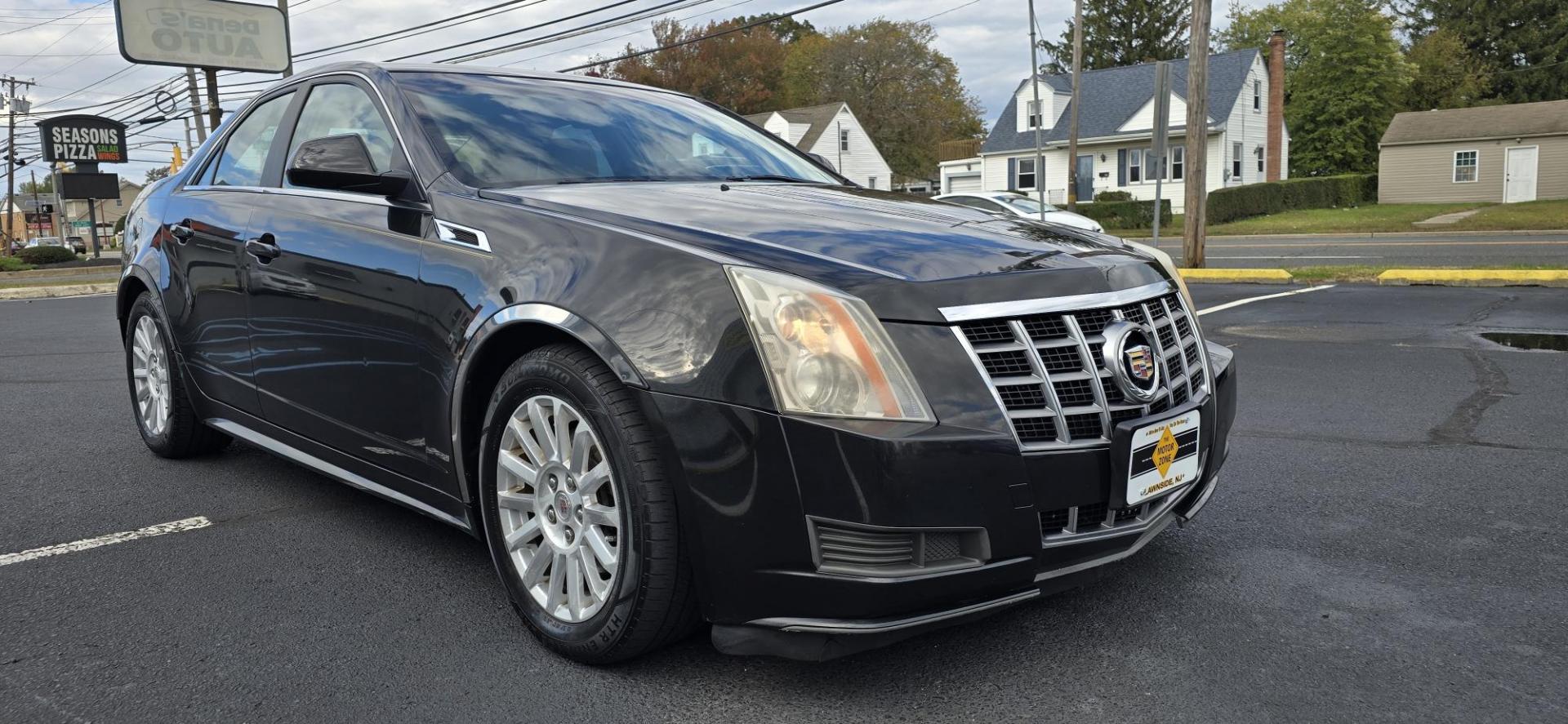 2012 Black /Tan Cadillac CTS Luxury AWD (1G6DG5E54C0) with an 3.0L V6 DOHC 24V FFV engine, 6-Speed Automatic transmission, located at 1010 N White Horse Pike, Stratford, NJ, 08084, (856) 262-9500, 39.838921, -75.011497 - Photo#1
