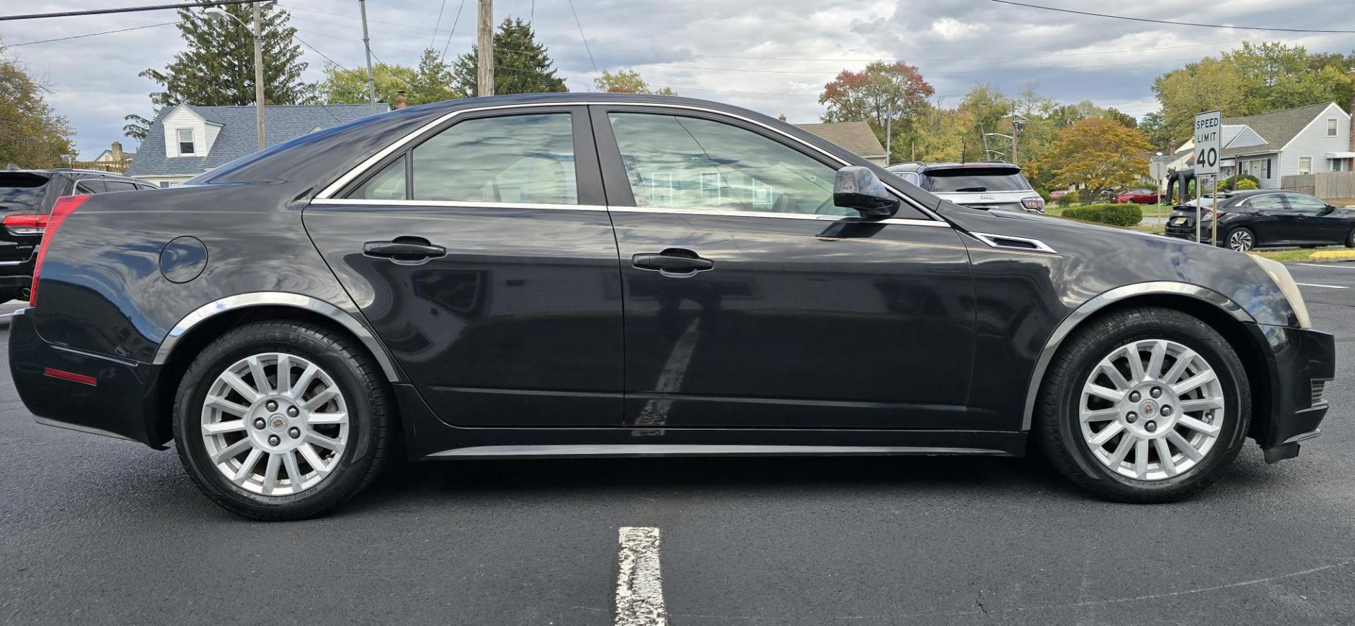 2012 Black /Tan Cadillac CTS Luxury AWD (1G6DG5E54C0) with an 3.0L V6 DOHC 24V FFV engine, 6-Speed Automatic transmission, located at 1010 N White Horse Pike, Stratford, NJ, 08084, (856) 262-9500, 39.838921, -75.011497 - Photo#5