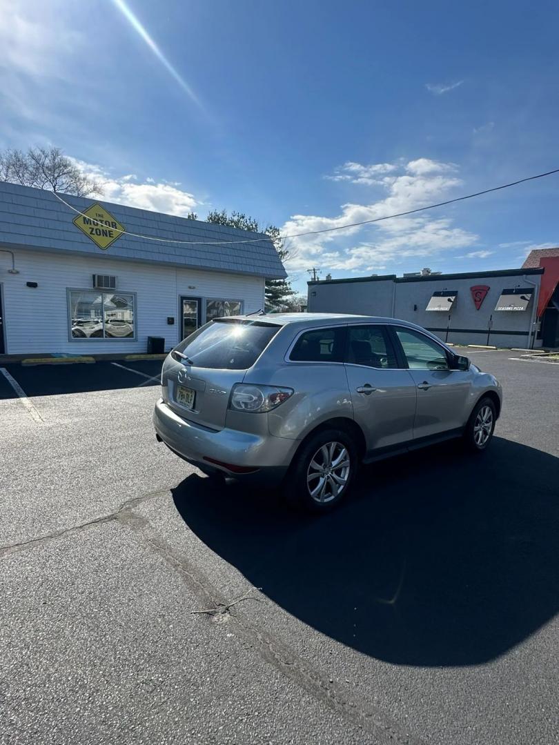 2010 Silver /Black Mazda CX-7 s Grand Touring (JM3ER2WLXA0) with an 2.3L L4 DOHC 16V TURBO engine, 6-Speed Automatic transmission, located at 1010 N White Horse Pike, Stratford, NJ, 08084, (856) 262-9500, 39.838921, -75.011497 - Photo#2