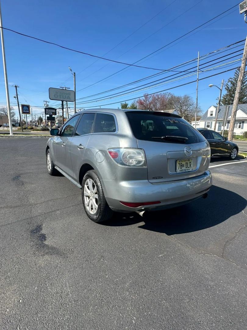 2010 Silver /Black Mazda CX-7 s Grand Touring (JM3ER2WLXA0) with an 2.3L L4 DOHC 16V TURBO engine, 6-Speed Automatic transmission, located at 1010 N White Horse Pike, Stratford, NJ, 08084, (856) 262-9500, 39.838921, -75.011497 - Photo#4