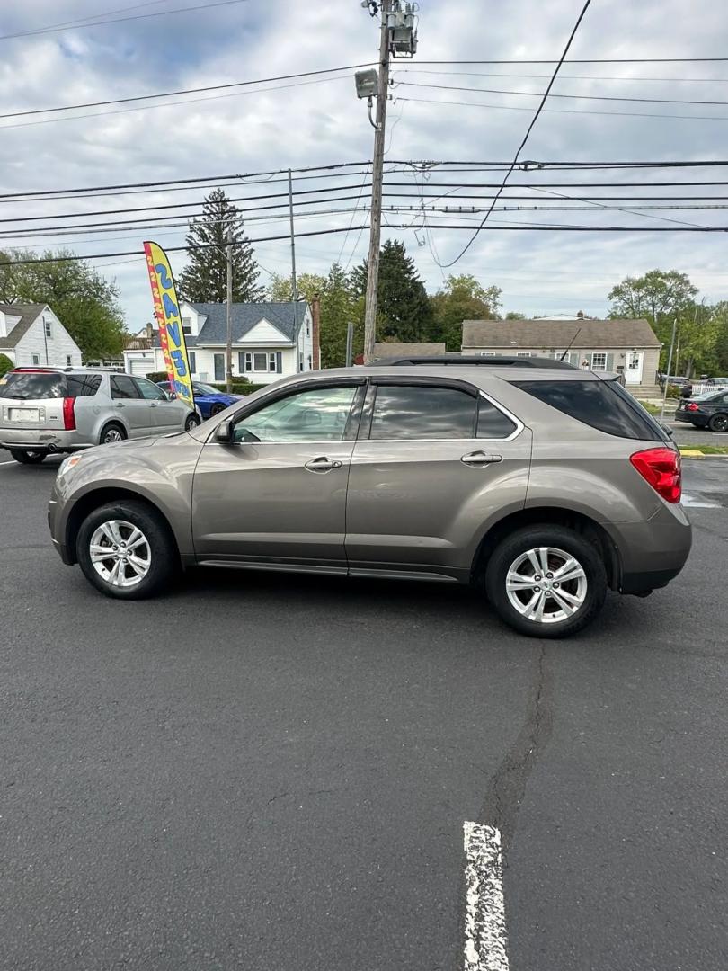 2011 Gold /Black Chevrolet Equinox 1LT 2WD (2CNALDECXB6) with an 2.4L L4 DOHC 16V engine, 6-Speed Automatic transmission, located at 1010 N White Horse Pike, Stratford, NJ, 08084, (856) 262-9500, 39.838921, -75.011497 - Photo#1