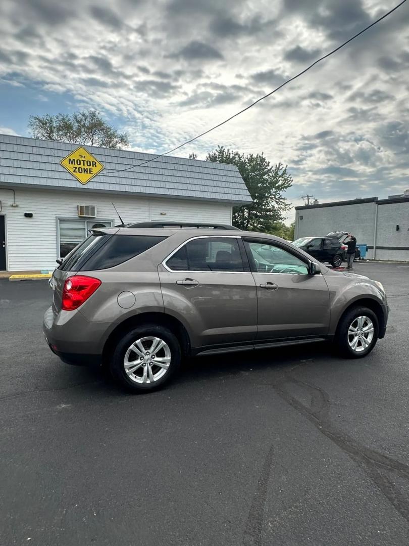 2011 Gold /Black Chevrolet Equinox 1LT 2WD (2CNALDECXB6) with an 2.4L L4 DOHC 16V engine, 6-Speed Automatic transmission, located at 1010 N White Horse Pike, Stratford, NJ, 08084, (856) 262-9500, 39.838921, -75.011497 - Photo#9