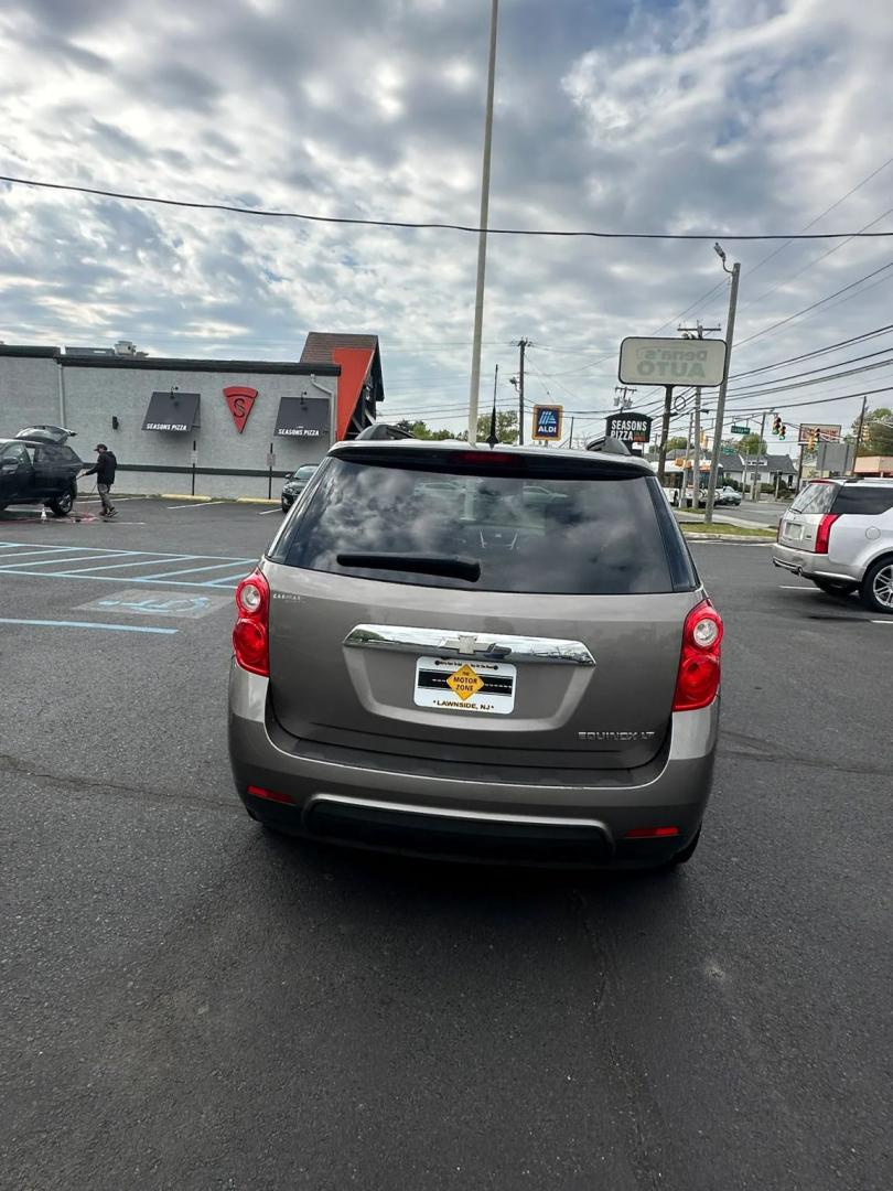 2011 Gold /Black Chevrolet Equinox 1LT 2WD (2CNALDECXB6) with an 2.4L L4 DOHC 16V engine, 6-Speed Automatic transmission, located at 1010 N White Horse Pike, Stratford, NJ, 08084, (856) 262-9500, 39.838921, -75.011497 - Photo#11