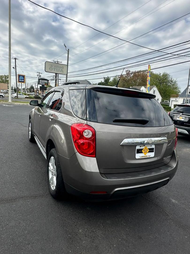 2011 Gold /Black Chevrolet Equinox 1LT 2WD (2CNALDECXB6) with an 2.4L L4 DOHC 16V engine, 6-Speed Automatic transmission, located at 1010 N White Horse Pike, Stratford, NJ, 08084, (856) 262-9500, 39.838921, -75.011497 - Photo#12