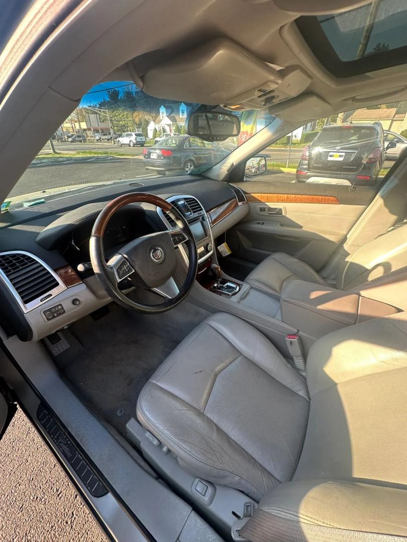 2008 Silver /Tan Cadillac SRX V6 AWD (1GYEE437880) with an 3.6L V6 OHV 24V engine, 5-Speed Automatic Overdrive transmission, located at 1010 N White Horse Pike, Stratford, NJ, 08084, (856) 262-9500, 39.838921, -75.011497 - Photo#9