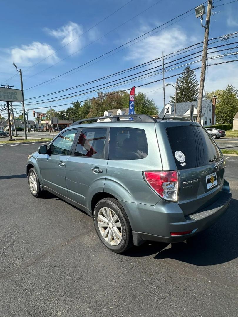 2011 Blue /Tan Subaru Forester 2.5X Premium (JF2SHADC5BH) with an 2.5L H4 SOHC 16V engine, 5-Speed Manual transmission, located at 1010 N White Horse Pike, Stratford, NJ, 08084, (856) 262-9500, 39.838921, -75.011497 - Photo#2