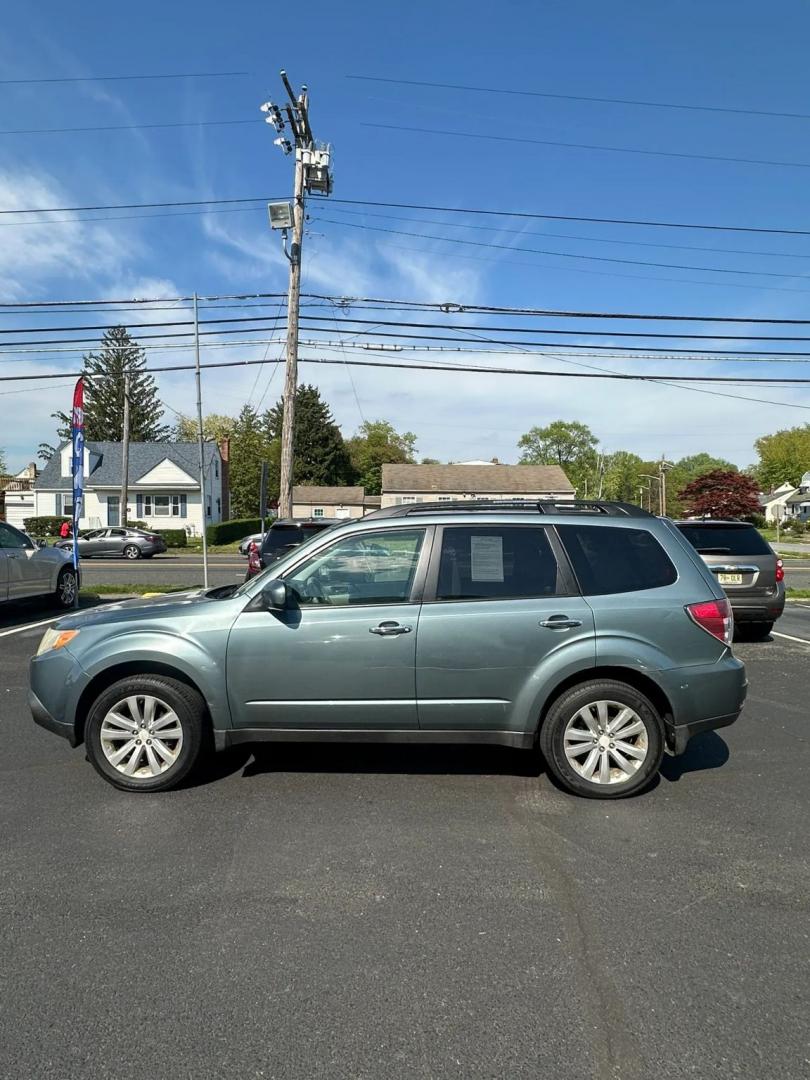2011 Blue /Tan Subaru Forester 2.5X Premium (JF2SHADC5BH) with an 2.5L H4 SOHC 16V engine, 5-Speed Manual transmission, located at 1010 N White Horse Pike, Stratford, NJ, 08084, (856) 262-9500, 39.838921, -75.011497 - Photo#3