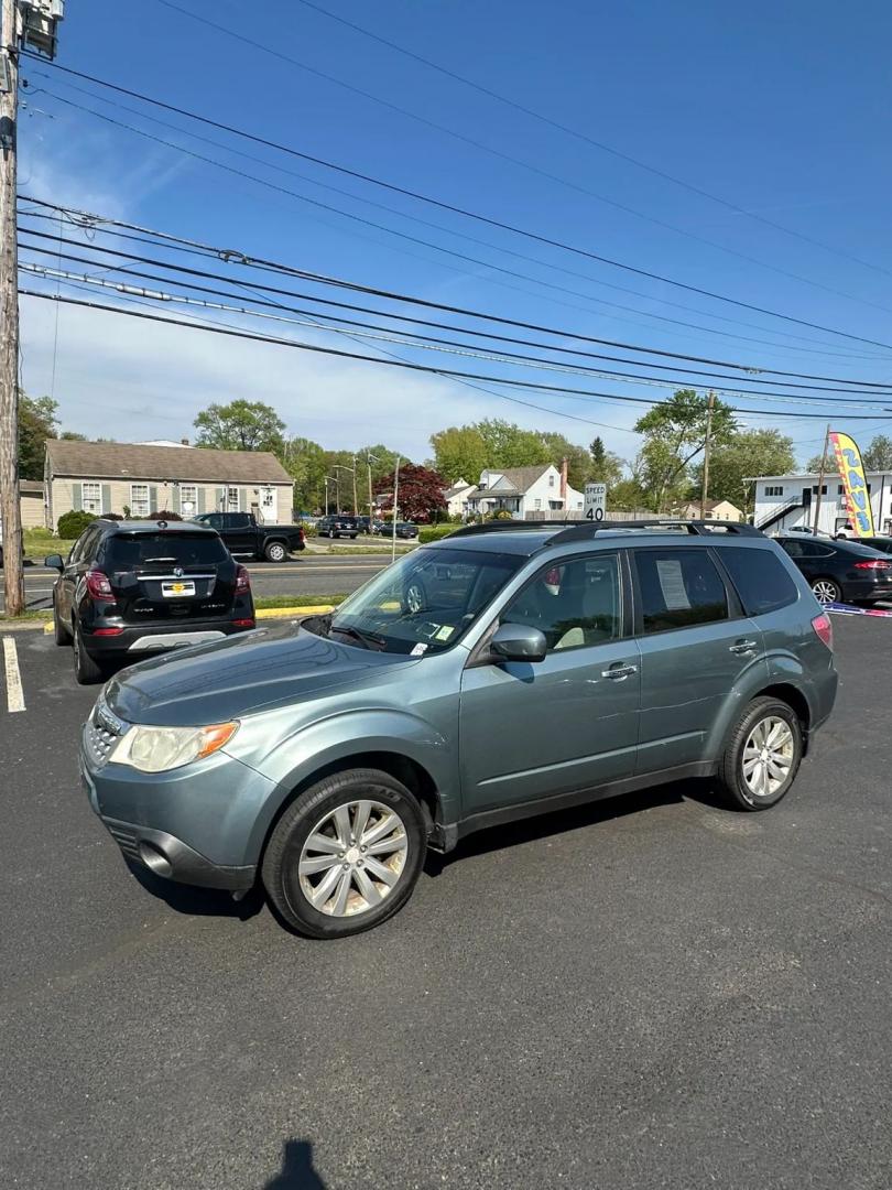 2011 Blue /Tan Subaru Forester 2.5X Premium (JF2SHADC5BH) with an 2.5L H4 SOHC 16V engine, 5-Speed Manual transmission, located at 1010 N White Horse Pike, Stratford, NJ, 08084, (856) 262-9500, 39.838921, -75.011497 - Photo#4