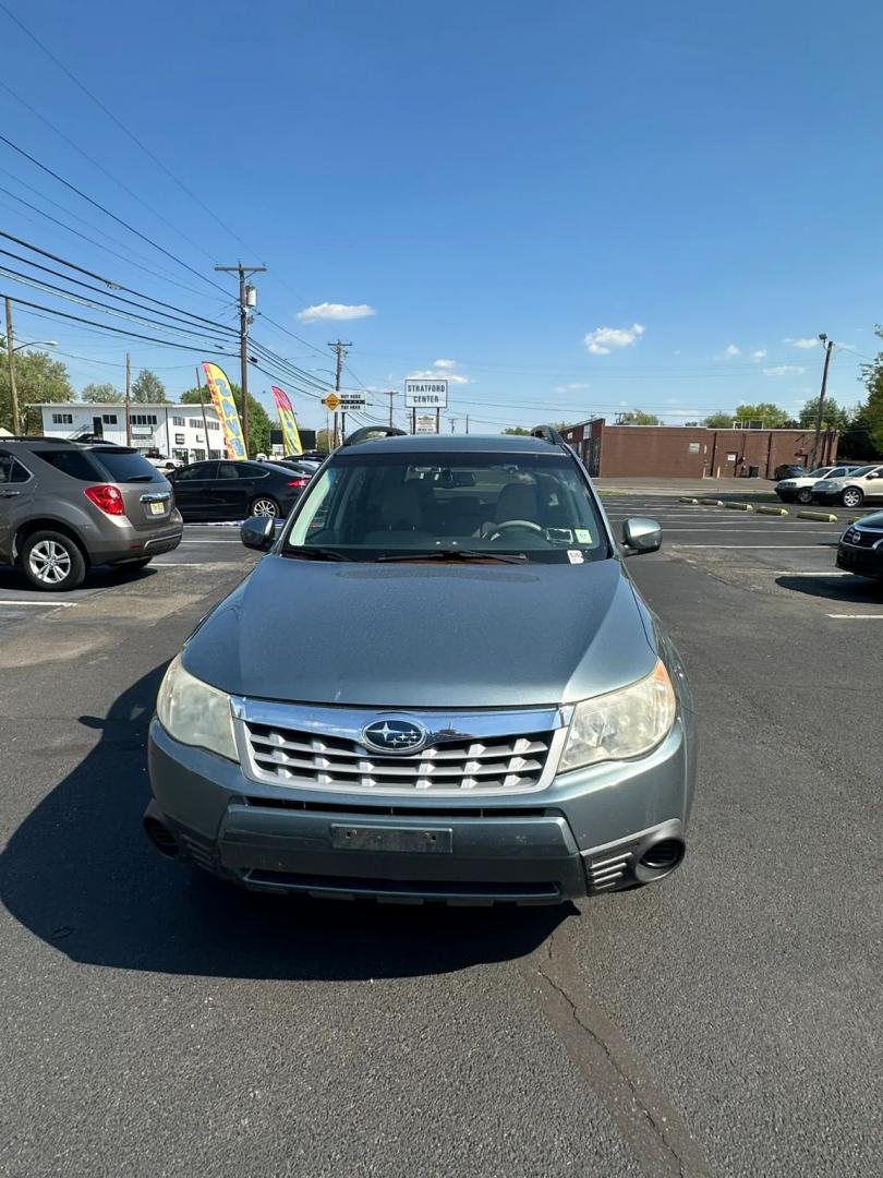 2011 Blue /Tan Subaru Forester 2.5X Premium (JF2SHADC5BH) with an 2.5L H4 SOHC 16V engine, 5-Speed Manual transmission, located at 1010 N White Horse Pike, Stratford, NJ, 08084, (856) 262-9500, 39.838921, -75.011497 - Photo#5