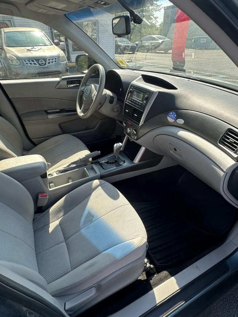 2011 Blue /Tan Subaru Forester 2.5X Premium (JF2SHADC5BH) with an 2.5L H4 SOHC 16V engine, 5-Speed Manual transmission, located at 1010 N White Horse Pike, Stratford, NJ, 08084, (856) 262-9500, 39.838921, -75.011497 - Photo#7