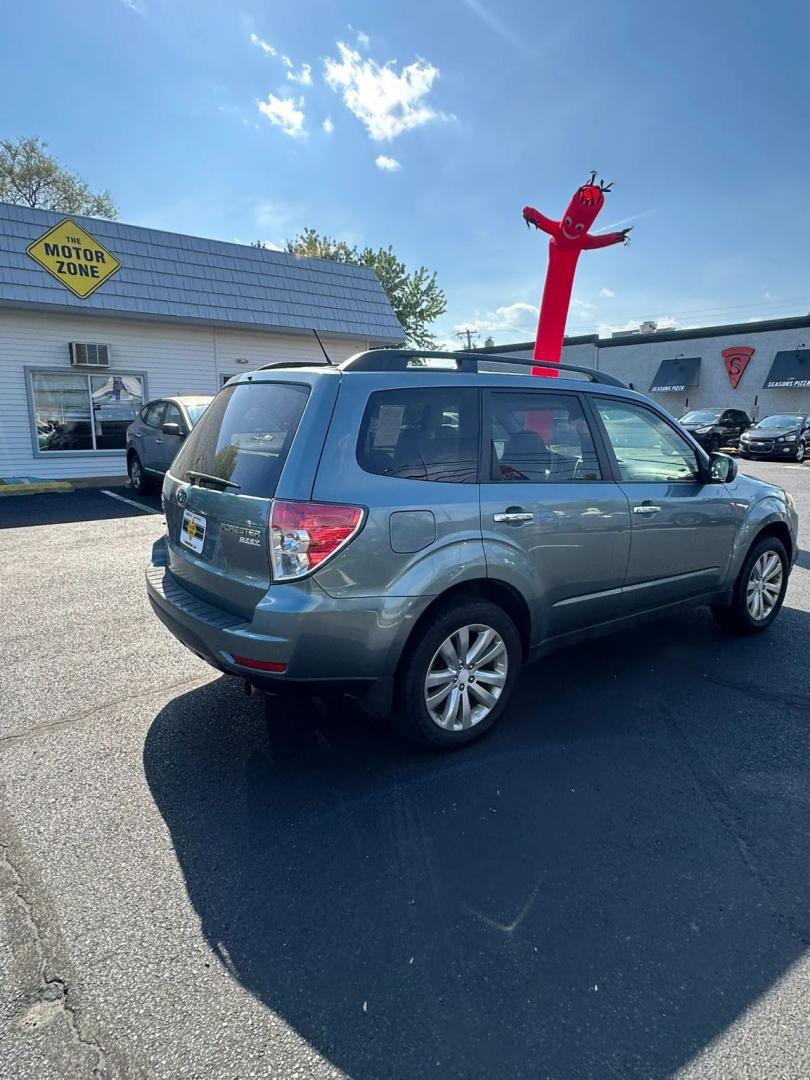 2011 Blue /Tan Subaru Forester 2.5X Premium (JF2SHADC5BH) with an 2.5L H4 SOHC 16V engine, 5-Speed Manual transmission, located at 1010 N White Horse Pike, Stratford, NJ, 08084, (856) 262-9500, 39.838921, -75.011497 - Photo#11