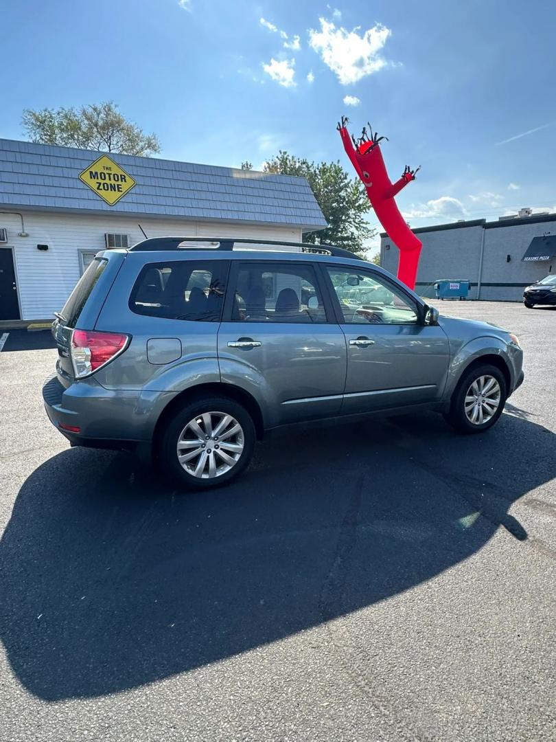 2011 Blue /Tan Subaru Forester 2.5X Premium (JF2SHADC5BH) with an 2.5L H4 SOHC 16V engine, 5-Speed Manual transmission, located at 1010 N White Horse Pike, Stratford, NJ, 08084, (856) 262-9500, 39.838921, -75.011497 - Photo#10