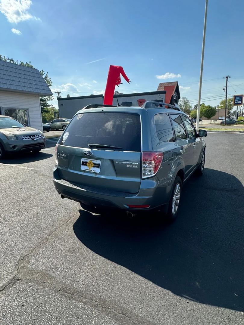 2011 Blue /Tan Subaru Forester 2.5X Premium (JF2SHADC5BH) with an 2.5L H4 SOHC 16V engine, 5-Speed Manual transmission, located at 1010 N White Horse Pike, Stratford, NJ, 08084, (856) 262-9500, 39.838921, -75.011497 - Photo#12