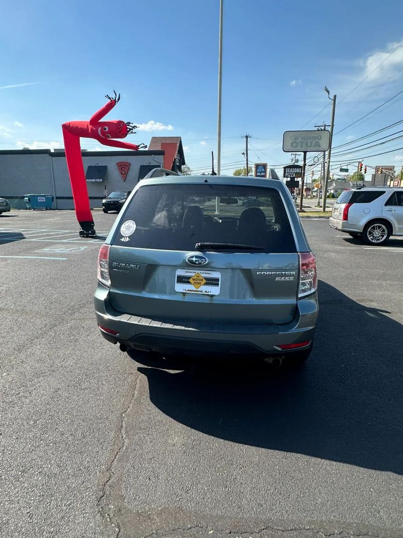 2011 Blue /Tan Subaru Forester 2.5X Premium (JF2SHADC5BH) with an 2.5L H4 SOHC 16V engine, 5-Speed Manual transmission, located at 1010 N White Horse Pike, Stratford, NJ, 08084, (856) 262-9500, 39.838921, -75.011497 - Photo#13