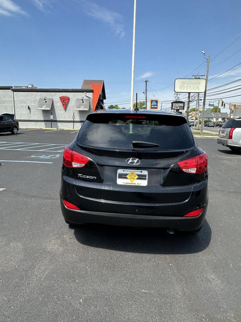 2015 Black /Tan Hyundai Tucson SE FWD (KM8JT3AF3FU) with an 2.0L L4 DOHC 16V engine, 6-Speed Automatic transmission, located at 1010 N White Horse Pike, Stratford, NJ, 08084, (856) 262-9500, 39.838921, -75.011497 - Photo#3