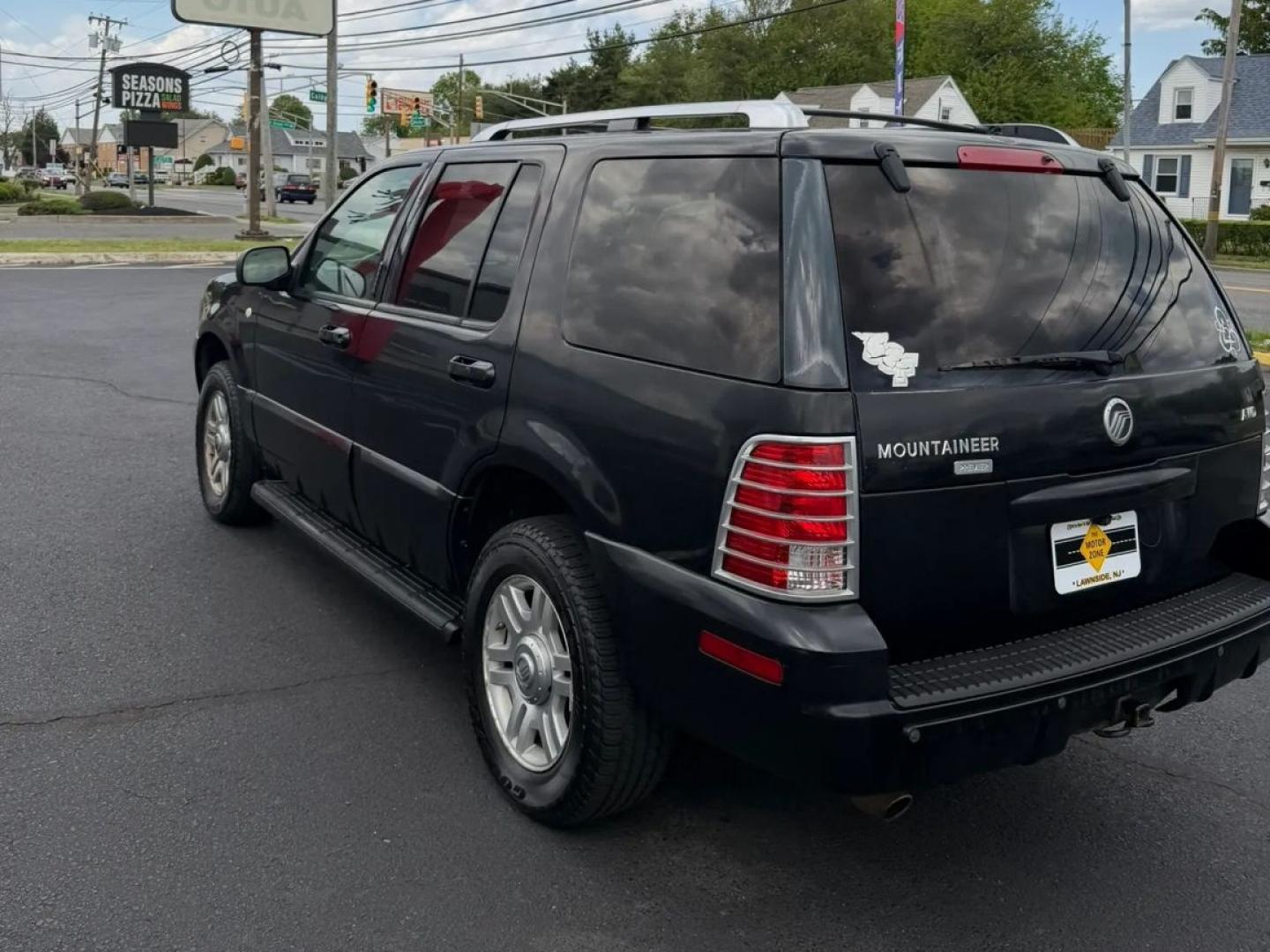 2004 Black /Black Mercury Mountaineer Convenience 4.0L AWD (4M2DU86E64Z) with an 4.0L V6 SOHC 12V engine, 5-Speed Automatic transmission, located at 1010 N White Horse Pike, Stratford, NJ, 08084, (856) 262-9500, 39.838921, -75.011497 - Photo#3