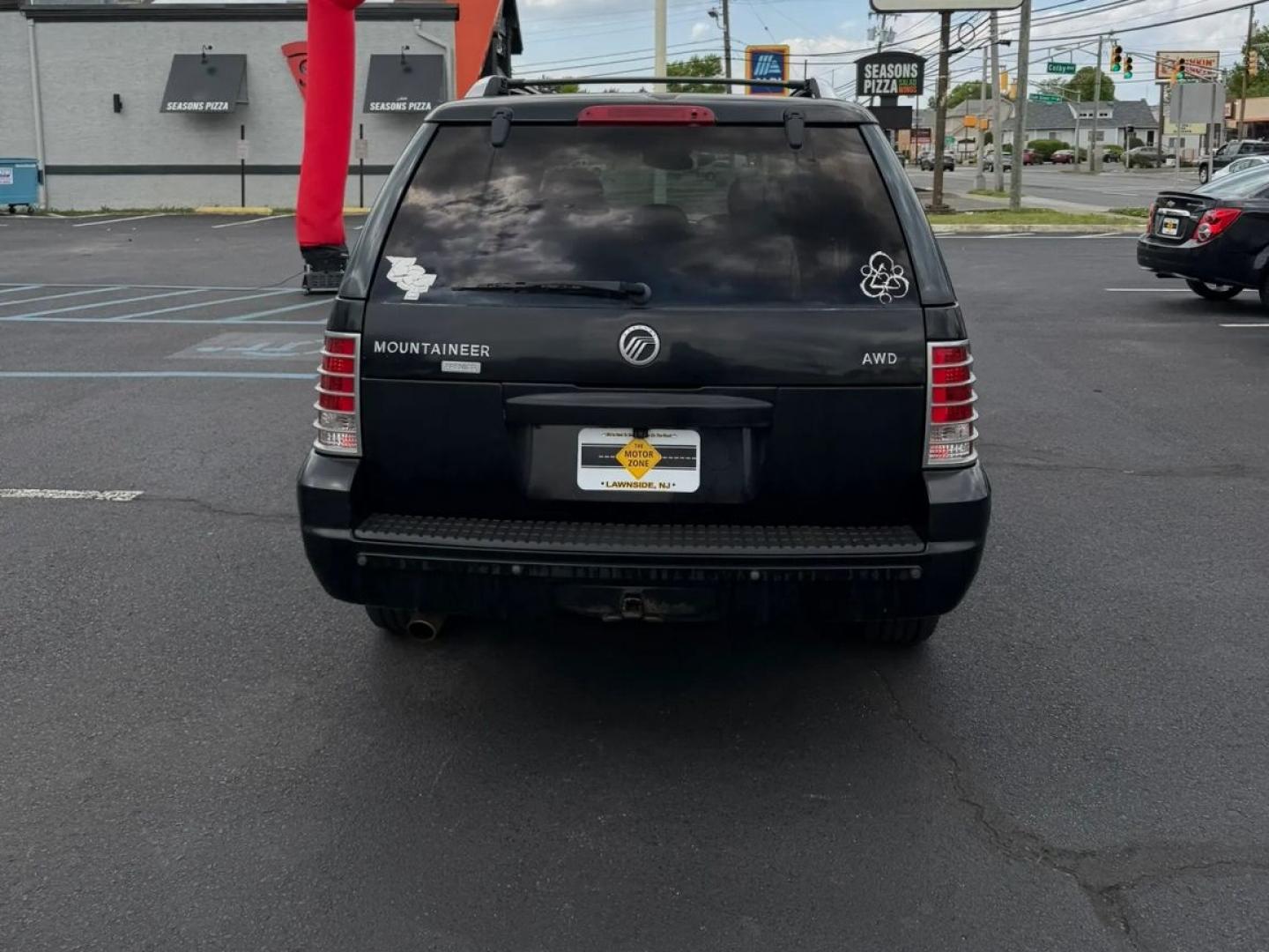 2004 Black /Black Mercury Mountaineer Convenience 4.0L AWD (4M2DU86E64Z) with an 4.0L V6 SOHC 12V engine, 5-Speed Automatic transmission, located at 1010 N White Horse Pike, Stratford, NJ, 08084, (856) 262-9500, 39.838921, -75.011497 - Photo#4
