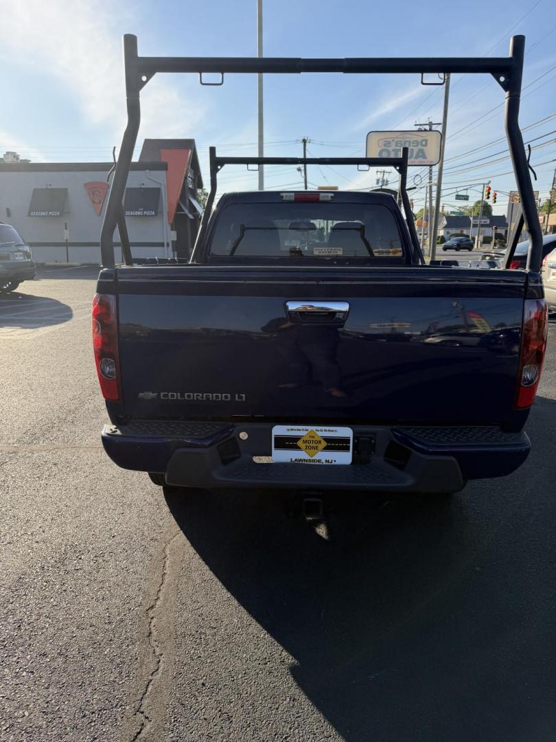 2011 Blue /Black Chevrolet Colorado 1LT Ext. Cab 4WD (1GCJTCFE4B8) with an 3.7L L5 DOHC 20V engine, located at 1010 N White Horse Pike, Stratford, NJ, 08084, (856) 262-9500, 39.838921, -75.011497 - Photo#2