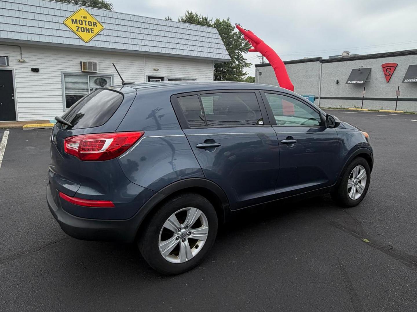 2013 Blue Kia Sportage LX FWD (KNDPB3A25D7) with an 2.4L V6 DOHC 24V engine, 6-Speed Automatic transmission, located at 1010 N White Horse Pike, Stratford, NJ, 08084, (856) 262-9500, 39.838921, -75.011497- Photo#6
