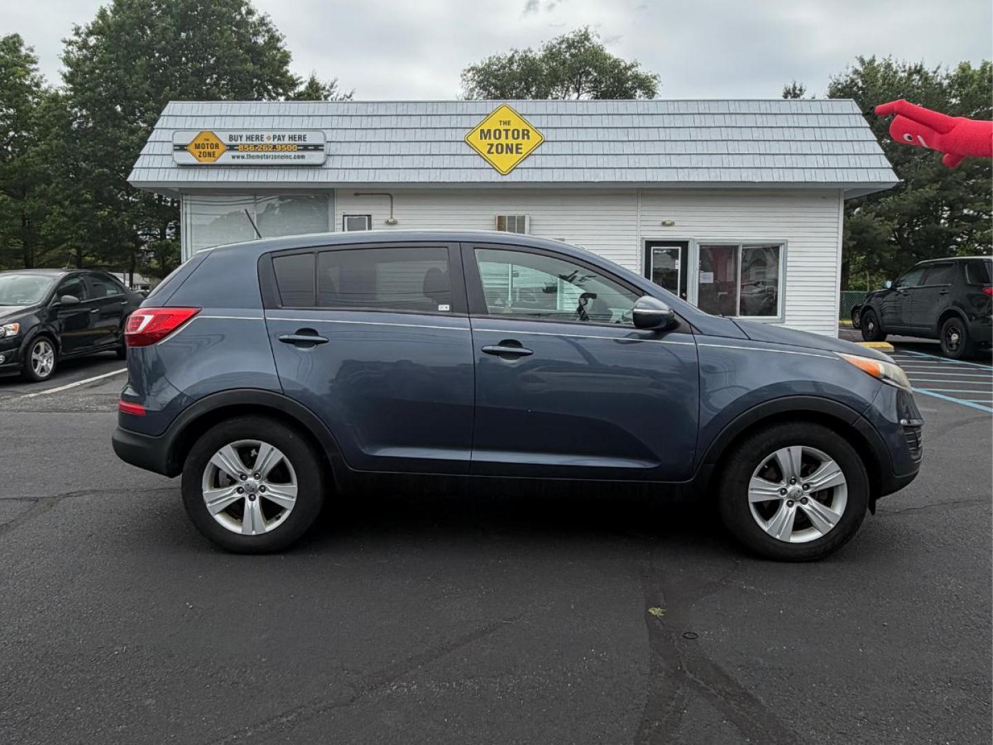 2013 Blue Kia Sportage LX FWD (KNDPB3A25D7) with an 2.4L V6 DOHC 24V engine, 6-Speed Automatic transmission, located at 1010 N White Horse Pike, Stratford, NJ, 08084, (856) 262-9500, 39.838921, -75.011497- Photo#7