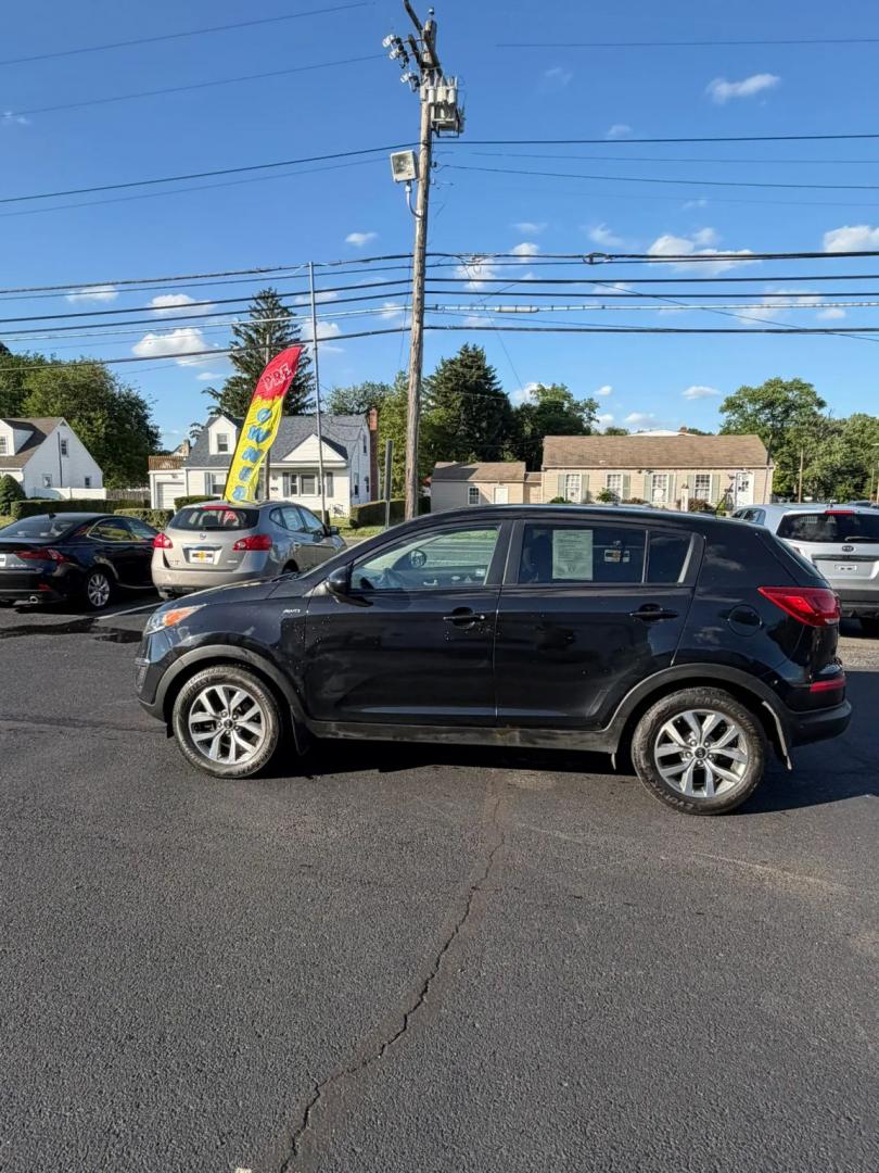 2016 Black /Black Kia Sportage LX AWD (KNDPBCAC1G7) with an 2.4L V6 DOHC 24V engine, 6-Speed Automatic transmission, located at 1010 N White Horse Pike, Stratford, NJ, 08084, (856) 262-9500, 39.838921, -75.011497 - Photo#3