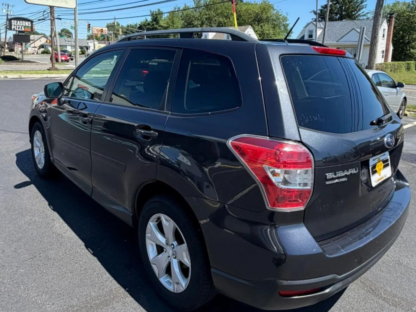 2015 Black /Beige Subaru Forester 2.5i Premium (JF2SJADC5FH) with an 2.5L H4 SOHC 16V engine, 6-Speed Automatic transmission, located at 1010 N White Horse Pike, Stratford, NJ, 08084, (856) 262-9500, 39.838921, -75.011497- Photo#1