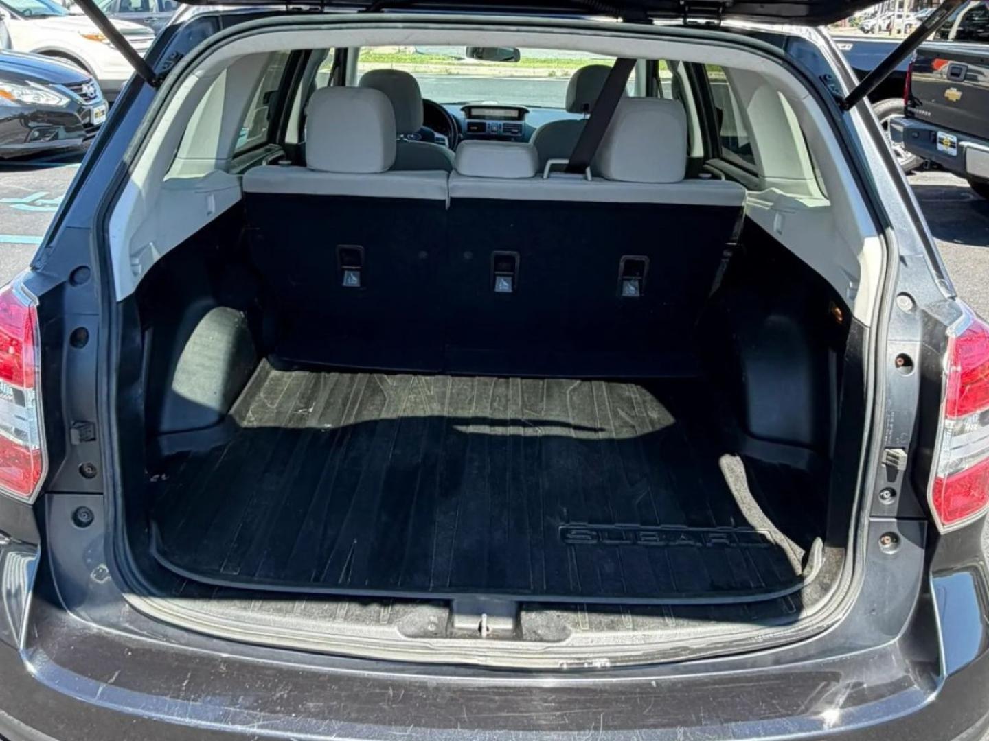 2015 Black /Beige Subaru Forester 2.5i Premium (JF2SJADC5FH) with an 2.5L H4 SOHC 16V engine, 6-Speed Automatic transmission, located at 1010 N White Horse Pike, Stratford, NJ, 08084, (856) 262-9500, 39.838921, -75.011497- Photo#9