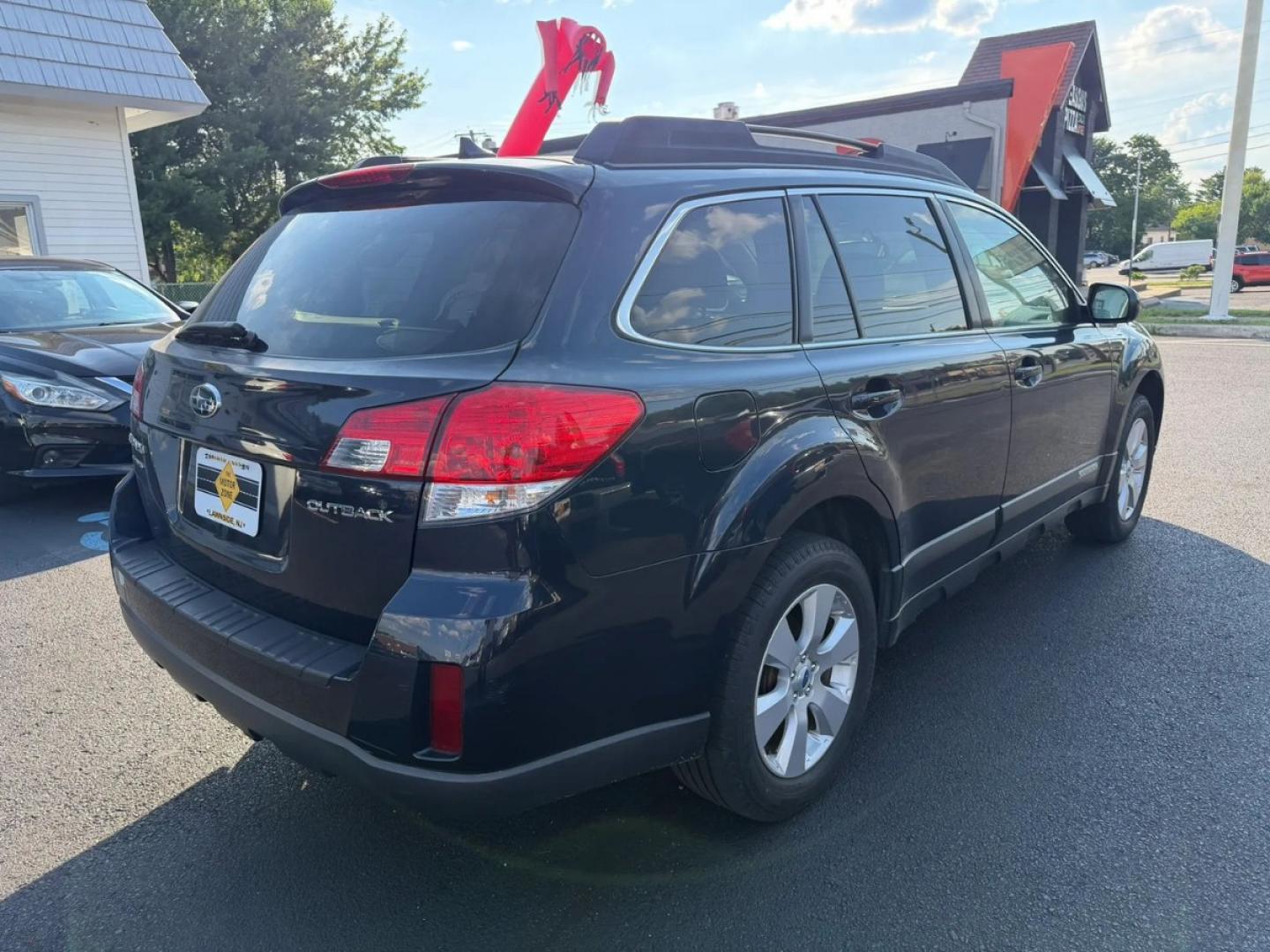 2012 Black /Beige Subaru Outback 2.5i Limited (4S4BRCKC7C3) with an 2.5L H4 DOHC 16V engine, located at 1010 N White Horse Pike, Stratford, NJ, 08084, (856) 262-9500, 39.838921, -75.011497- Photo#2