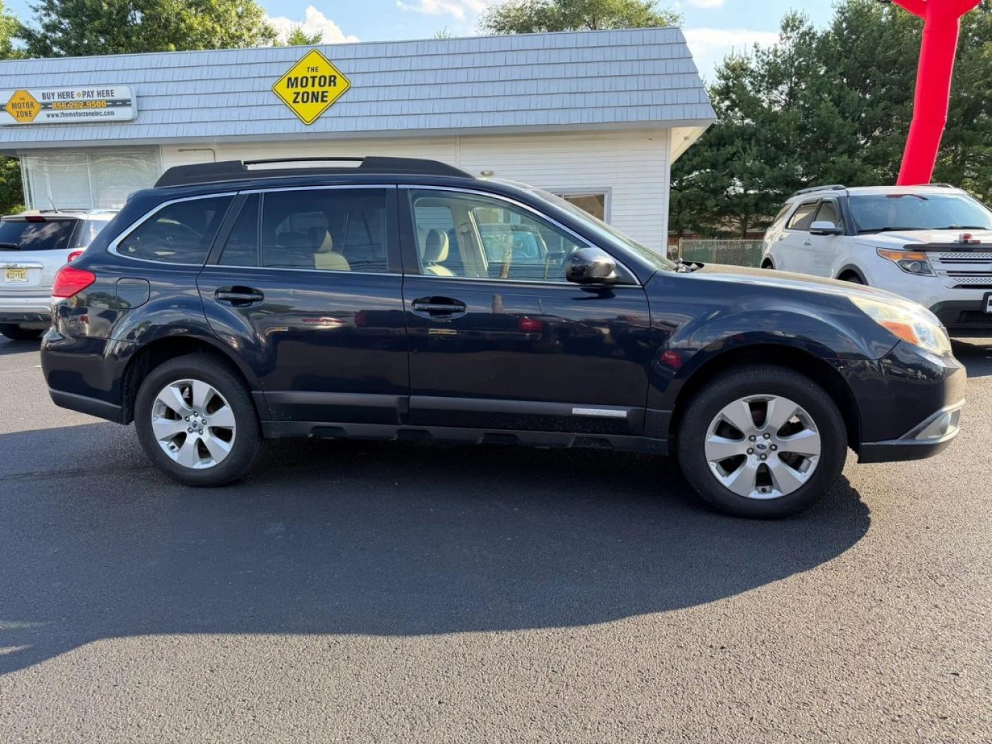 2012 Black /Beige Subaru Outback 2.5i Limited (4S4BRCKC7C3) with an 2.5L H4 DOHC 16V engine, located at 1010 N White Horse Pike, Stratford, NJ, 08084, (856) 262-9500, 39.838921, -75.011497- Photo#4