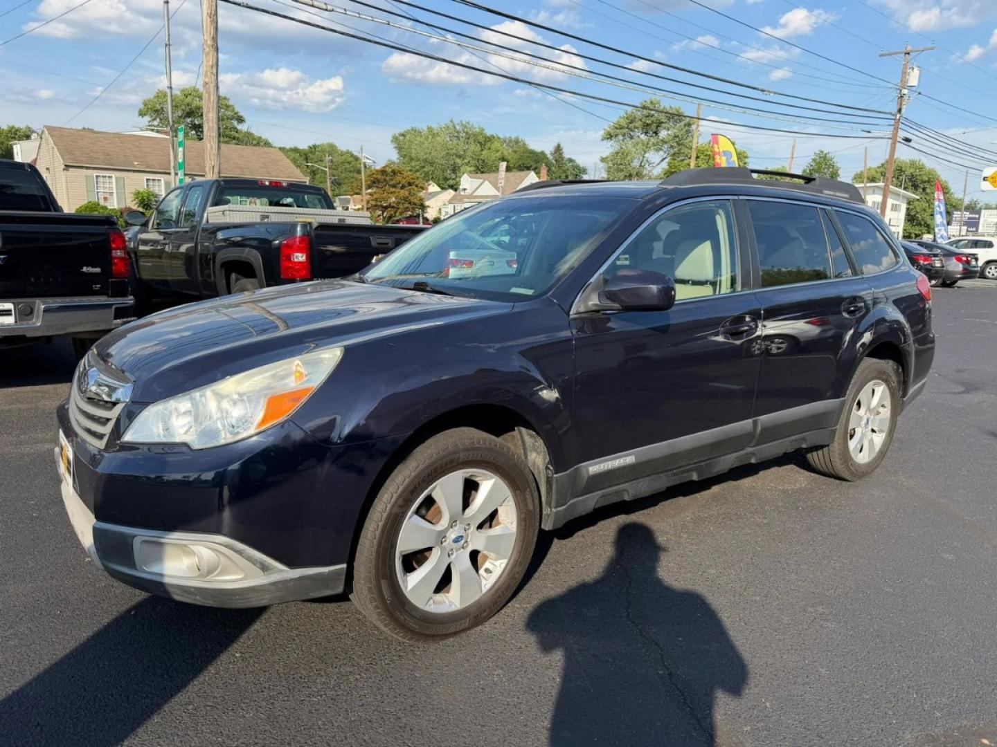 2012 Black /Beige Subaru Outback 2.5i Limited (4S4BRCKC7C3) with an 2.5L H4 DOHC 16V engine, located at 1010 N White Horse Pike, Stratford, NJ, 08084, (856) 262-9500, 39.838921, -75.011497- Photo#0
