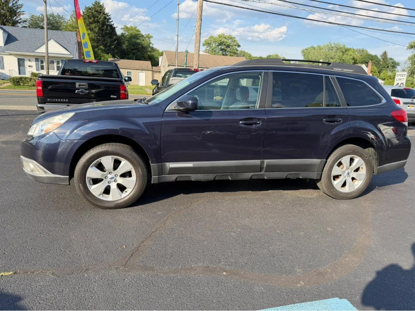 2012 Black /Beige Subaru Outback 2.5i Limited (4S4BRCKC7C3) with an 2.5L H4 DOHC 16V engine, located at 1010 N White Horse Pike, Stratford, NJ, 08084, (856) 262-9500, 39.838921, -75.011497- Photo#1
