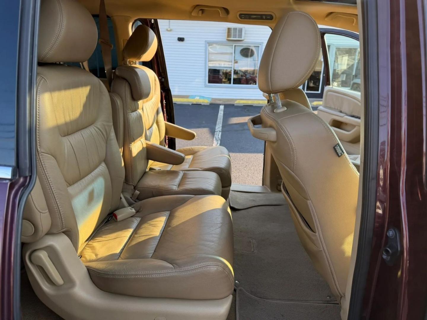 2010 Maroon /Beige Honda Odyssey EX-L w/ DVD (5FNRL3H79AB) with an 3.5L V6 SOHC 24V engine, 5A transmission, located at 1010 N White Horse Pike, Stratford, NJ, 08084, (856) 262-9500, 39.838921, -75.011497- Photo#6
