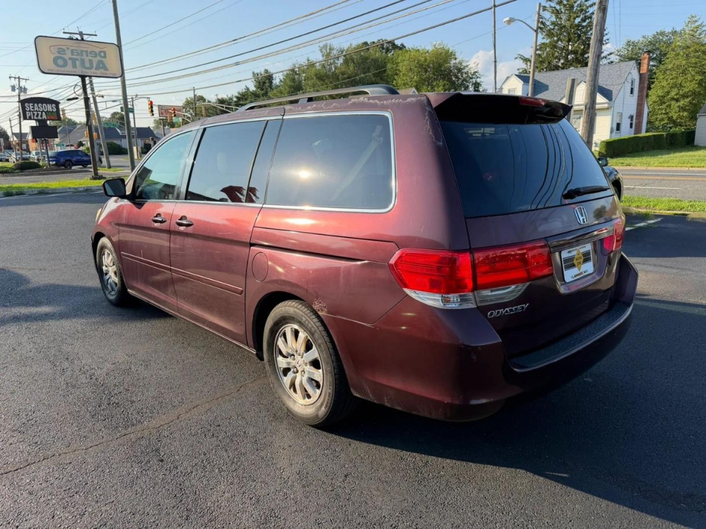 2010 Maroon /Beige Honda Odyssey EX-L w/ DVD (5FNRL3H79AB) with an 3.5L V6 SOHC 24V engine, 5A transmission, located at 1010 N White Horse Pike, Stratford, NJ, 08084, (856) 262-9500, 39.838921, -75.011497- Photo#2