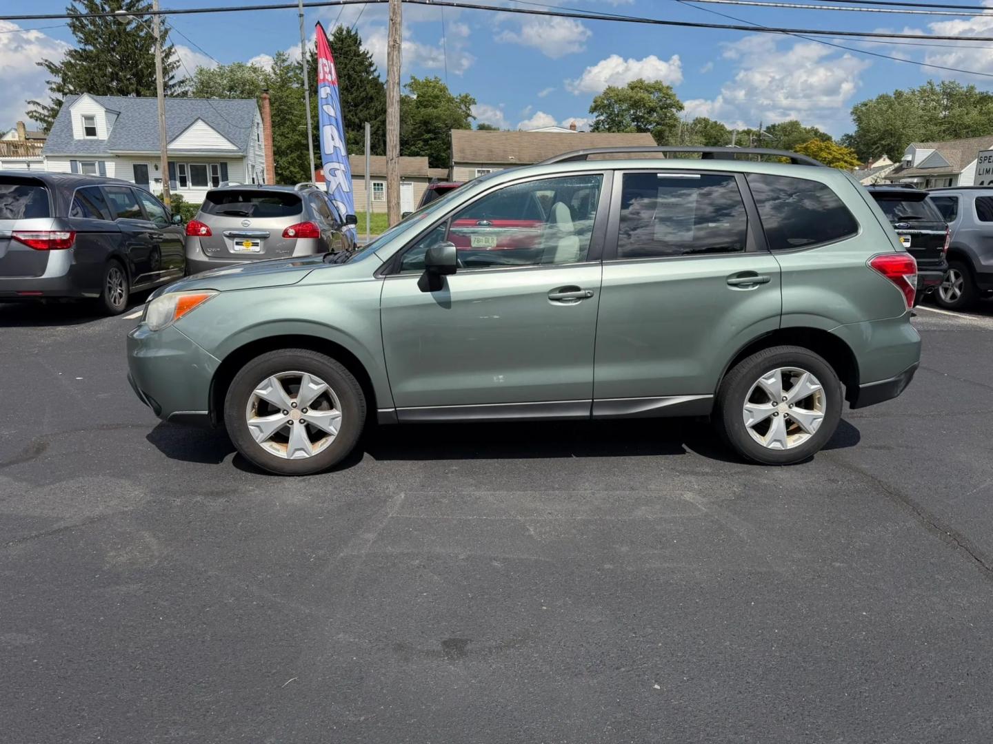 2014 Subaru Forester 2.5i Premium (JF2SJAEC7EH) with an 2.5L H4 SOHC 16V engine, 6A transmission, located at 1010 N White Horse Pike, Stratford, NJ, 08084, (856) 262-9500, 39.838921, -75.011497- Photo#2