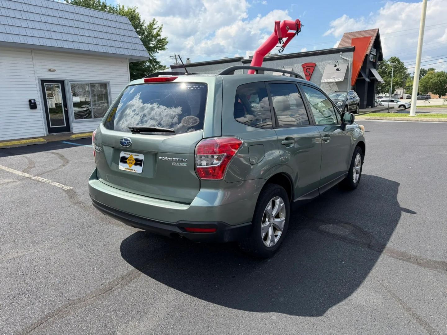 2014 Subaru Forester 2.5i Premium (JF2SJAEC7EH) with an 2.5L H4 SOHC 16V engine, 6A transmission, located at 1010 N White Horse Pike, Stratford, NJ, 08084, (856) 262-9500, 39.838921, -75.011497- Photo#7