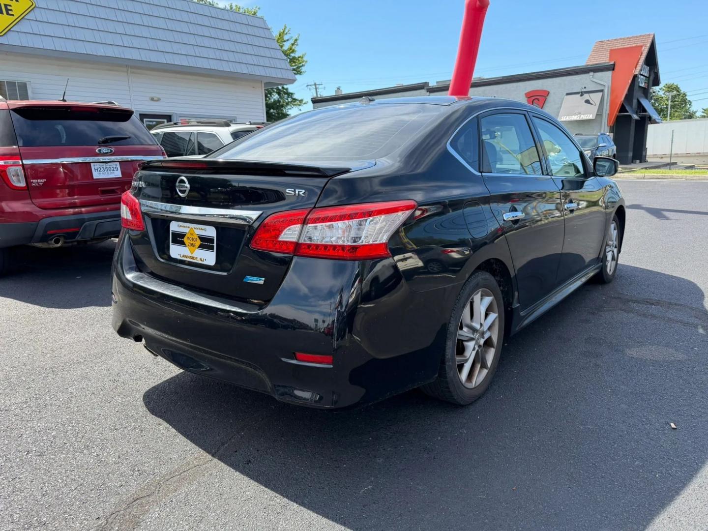 2014 Nissan Sentra SR (3N1AB7AP3EL) with an 1.8L L4 SFI DOHC 16V engine, AUTOMATIC transmission, located at 1010 N White Horse Pike, Stratford, NJ, 08084, (856) 262-9500, 39.838921, -75.011497- Photo#2
