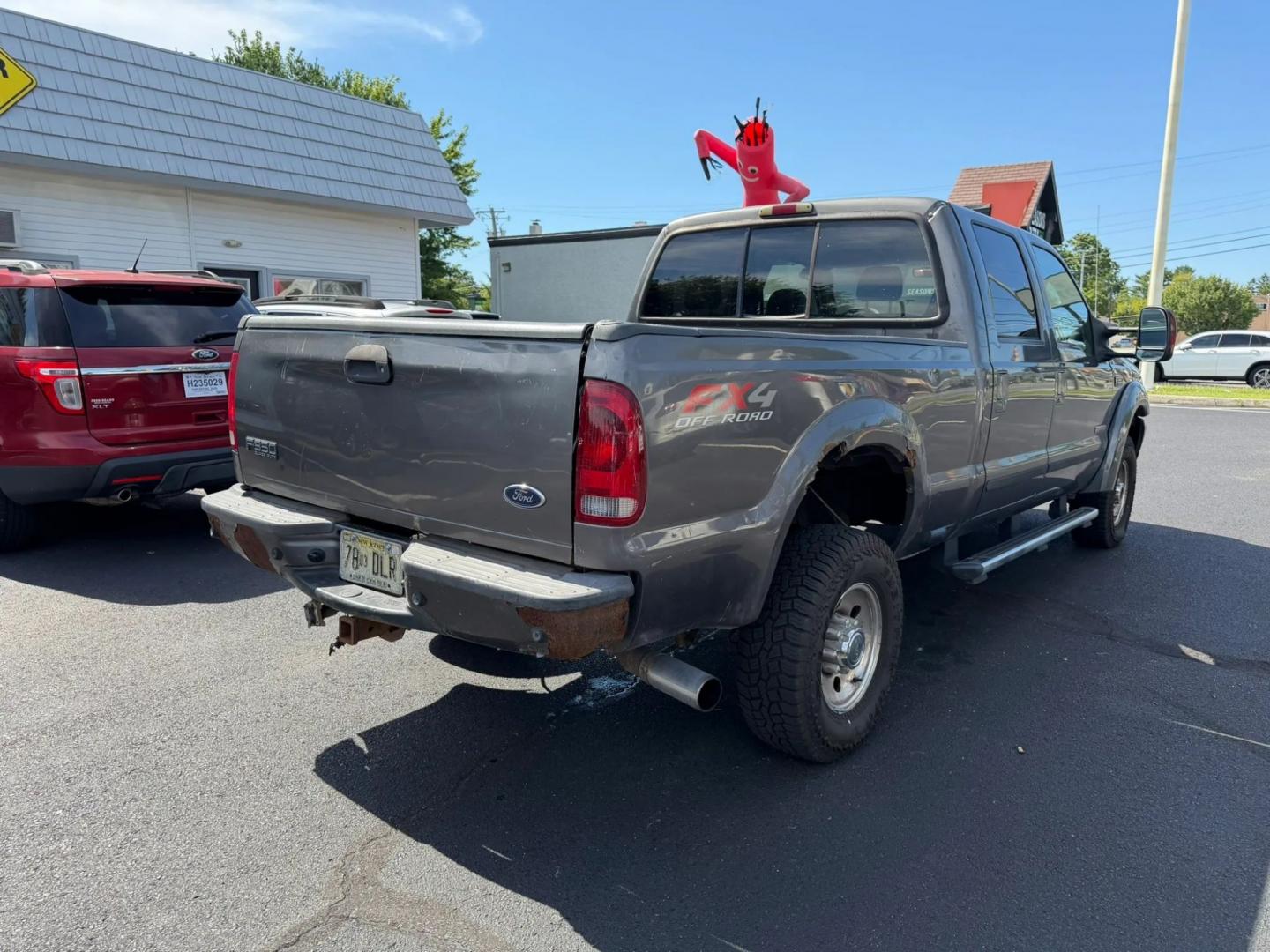 2004 Ford F-350 SD Lariat Crew Cab 4WD (1FTSW31P84E) with an 6.0L V8 OHV 32V TURBO DIESEL engine, located at 1010 N White Horse Pike, Stratford, NJ, 08084, (856) 262-9500, 39.838921, -75.011497- Photo#2