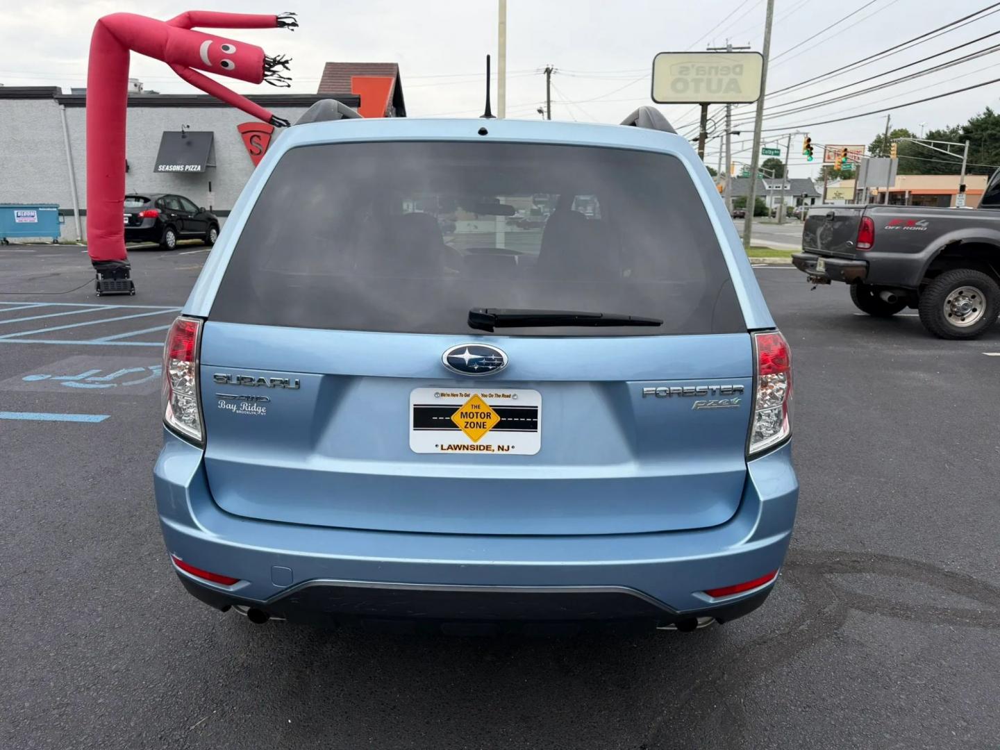 2012 Subaru Forester 2.5X Premium (JF2SHADCXCH) with an 2.5L H4 SOHC 16V engine, 4-Speed Automatic transmission, located at 1010 N White Horse Pike, Stratford, NJ, 08084, (856) 262-9500, 39.838921, -75.011497- Photo#3