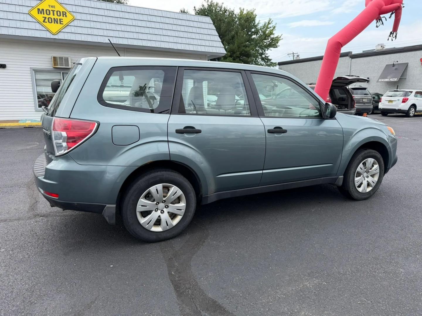 2009 Subaru Forester 2.5X (JF2SH61639H) with an 2.5L H4 SOHC 16V engine, 4A OD transmission, located at 1010 N White Horse Pike, Stratford, NJ, 08084, (856) 262-9500, 39.838921, -75.011497- Photo#1
