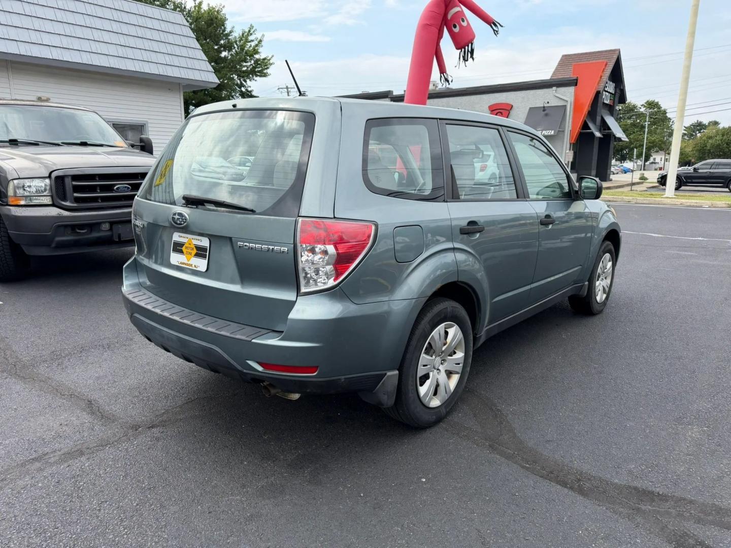 2009 Subaru Forester 2.5X (JF2SH61639H) with an 2.5L H4 SOHC 16V engine, 4A OD transmission, located at 1010 N White Horse Pike, Stratford, NJ, 08084, (856) 262-9500, 39.838921, -75.011497- Photo#2