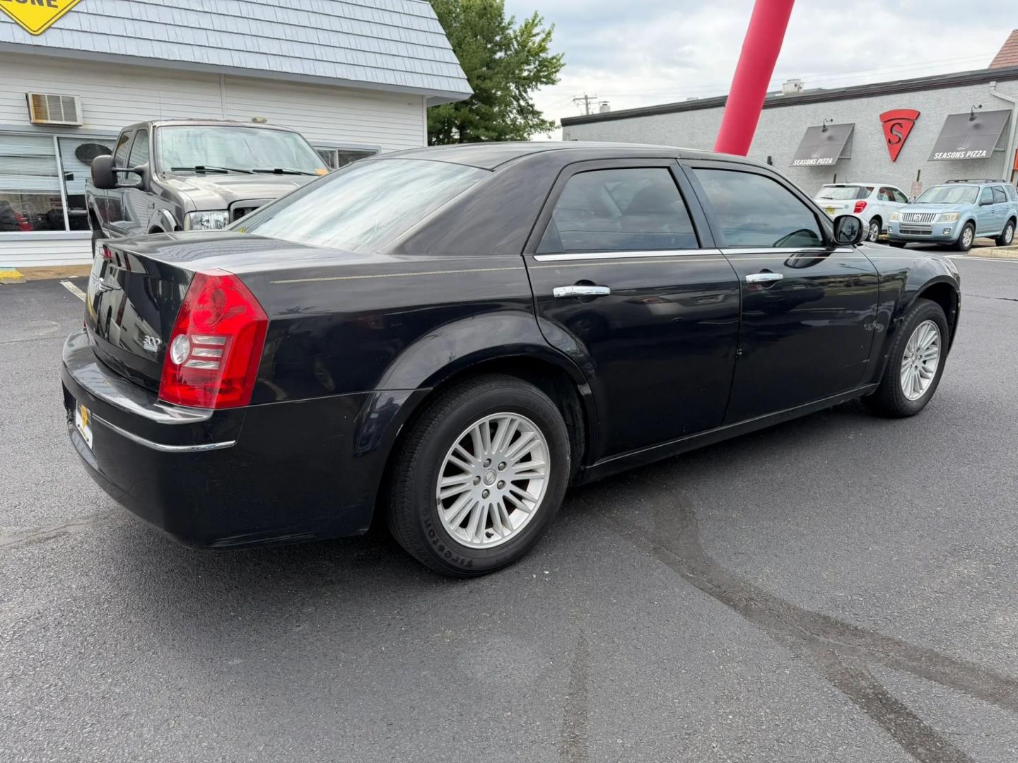 2010 Chrysler 300 LX (2C3CA4CDXAH) with an 2.7L V6 DOHC 24V engine, 4A transmission, located at 1010 N White Horse Pike, Stratford, NJ, 08084, (856) 262-9500, 39.838921, -75.011497- Photo#2
