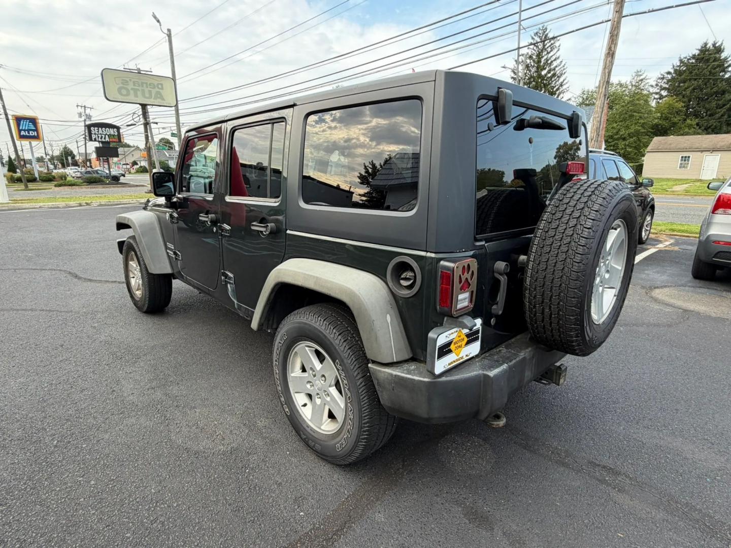 2012 Jeep Wrangler Unlimited Sport 4WD (1C4BJWDG4CL) with an 3.6L V6 DOHC 24V FFV engine, located at 1010 N White Horse Pike, Stratford, NJ, 08084, (856) 262-9500, 39.838921, -75.011497- Photo#4