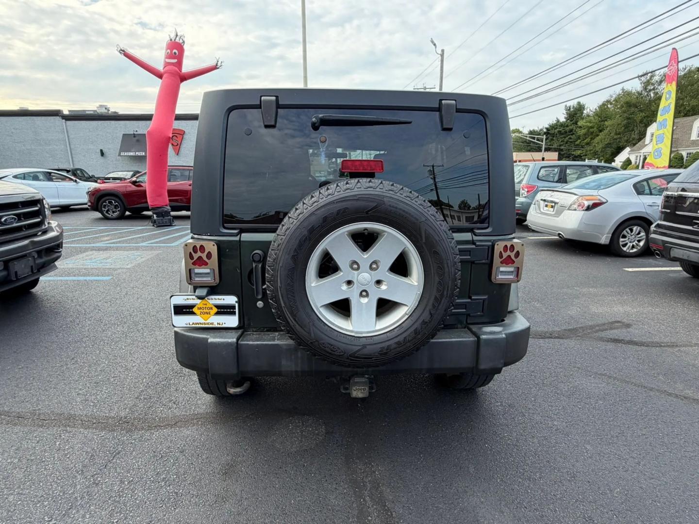 2012 Jeep Wrangler Unlimited Sport 4WD (1C4BJWDG4CL) with an 3.6L V6 DOHC 24V FFV engine, located at 1010 N White Horse Pike, Stratford, NJ, 08084, (856) 262-9500, 39.838921, -75.011497- Photo#3