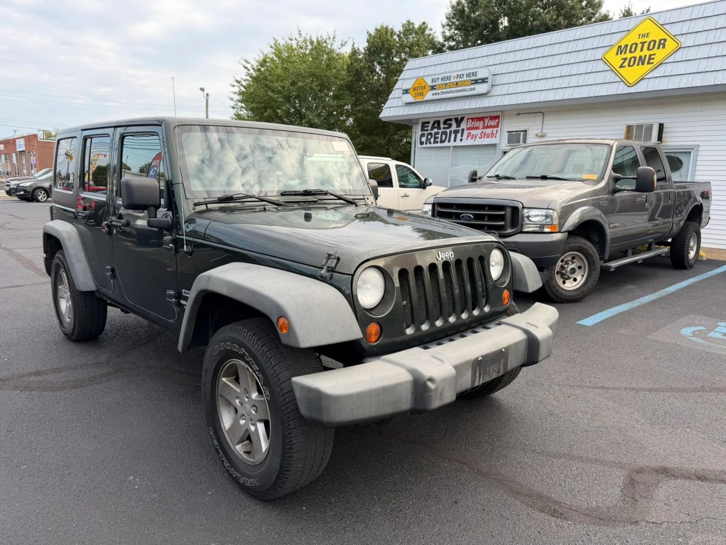 2012 Jeep Wrangler Unlimited Sport 4WD (1C4BJWDG4CL) with an 3.6L V6 DOHC 24V FFV engine, located at 1010 N White Horse Pike, Stratford, NJ, 08084, (856) 262-9500, 39.838921, -75.011497- Photo#9