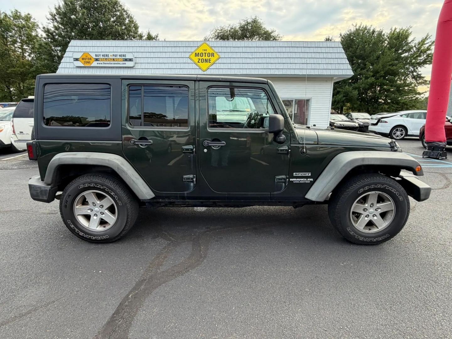 2012 Jeep Wrangler Unlimited Sport 4WD (1C4BJWDG4CL) with an 3.6L V6 DOHC 24V FFV engine, located at 1010 N White Horse Pike, Stratford, NJ, 08084, (856) 262-9500, 39.838921, -75.011497- Photo#0